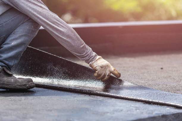 Professional Waterproofing technician working in Grelton, OH